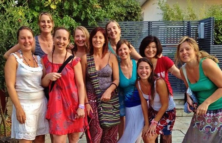 Athens Red Tent: All smiles after a monthly talking-stick sharing circle. The Red Tent community was international. There are 6 countries represented in this photo!